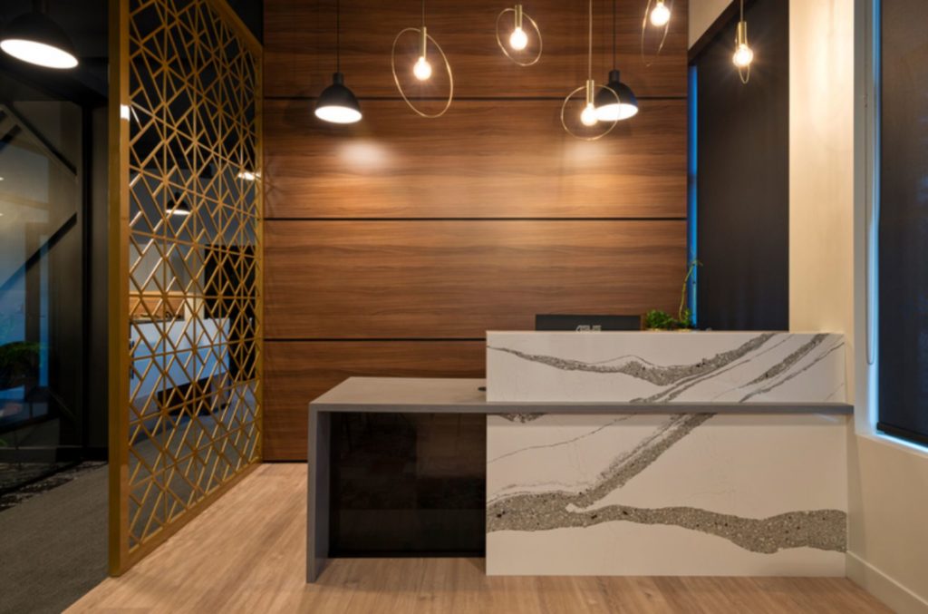 Penticton Law firm modern reception area with wood slat feature wall.