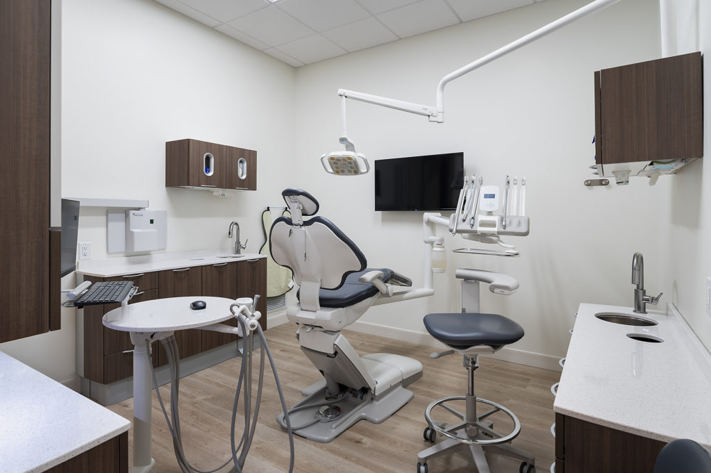 Operatory room with white walls at Kelowna Dental Clinic.