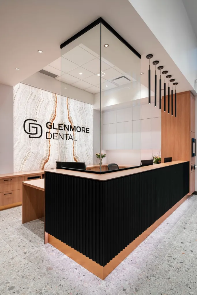 the reception desk at Glenmore Dental, a design-build project by Chriscan Construction