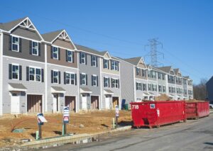 A row of townhouses being built.